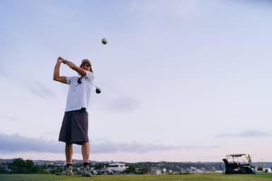 Golfer walking the fairway